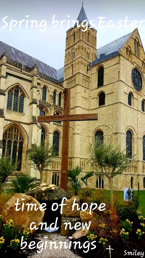 cathedral church with a cross and spring brings Easter time of hope and new beginnings