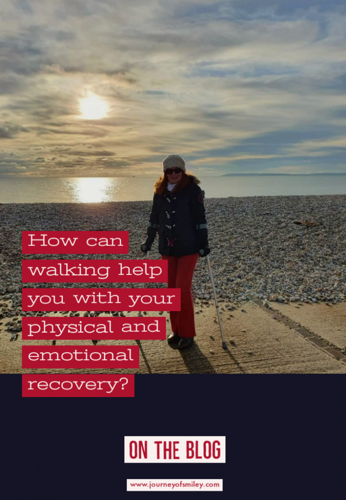 Woman on crutches standing in front of the sea and pebble beach, writing how can walking help your recovery, on Journeyofsmiley blog