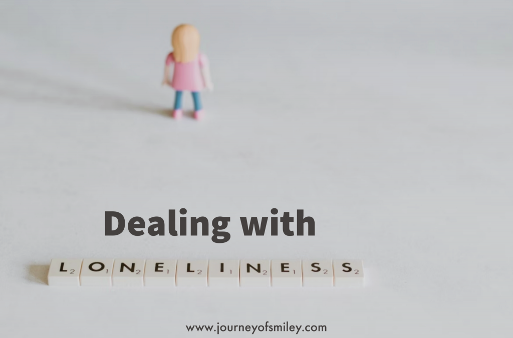 a colourful Lego figure alone on it's own on a grey background and under is title Ways to cope with loneliness on Journeyofsmiley blog