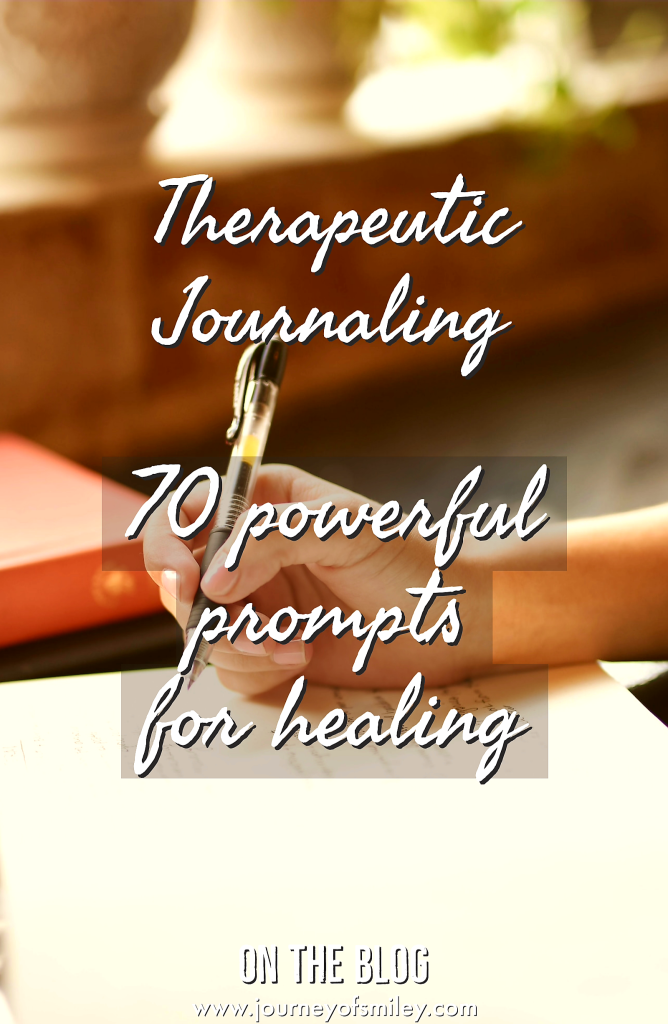 A hand holding a pen on a paper and writing, over it is the title Therapeutic journaling and prompts for healing on the Journeyofsmiley blog