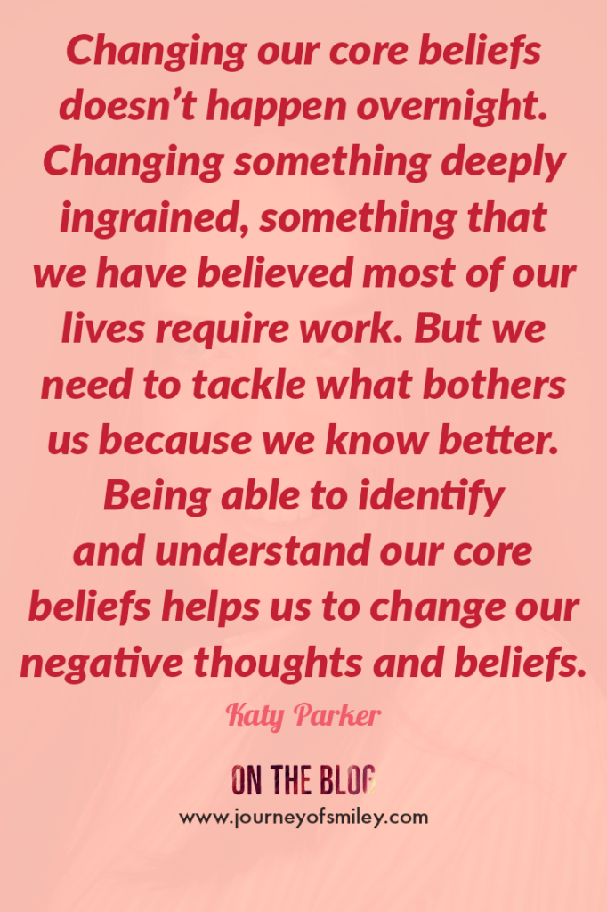 Pink background with an inspirational quote about changing our core beliefs by Katy Parker on the Journeyofsmiley blog