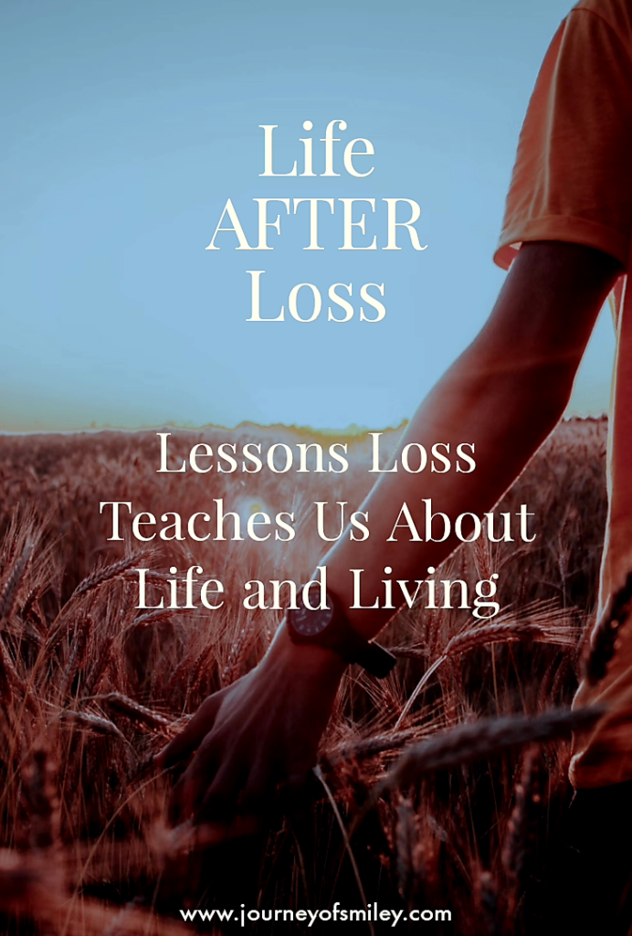 A hand in the field on the crops and blue sky with the title Life after loss Lessons loss teaches us about life and living on the Journeyofsmiley blog