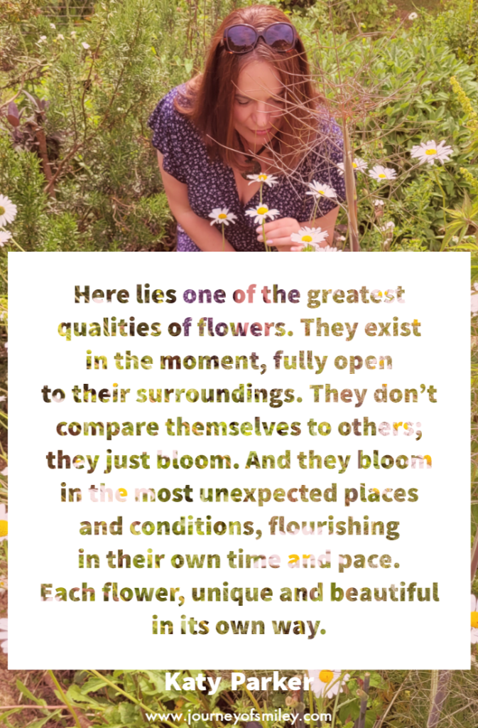 A woman standing over the flower, smelling flowers and below is an inspirational quote about the power of flowers and being inspired by flowers by Katy Parker on Journeyofsmiley