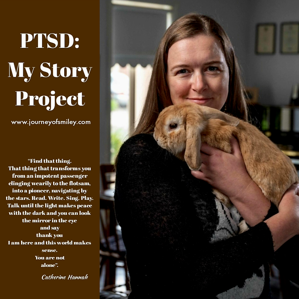 A profile photo of a woman with long brown hair with a brown rabbit in her arms on the right side and the title PTSD: My Story Project on the left side with an inspirational quote on Journeyofsmiley Blog.