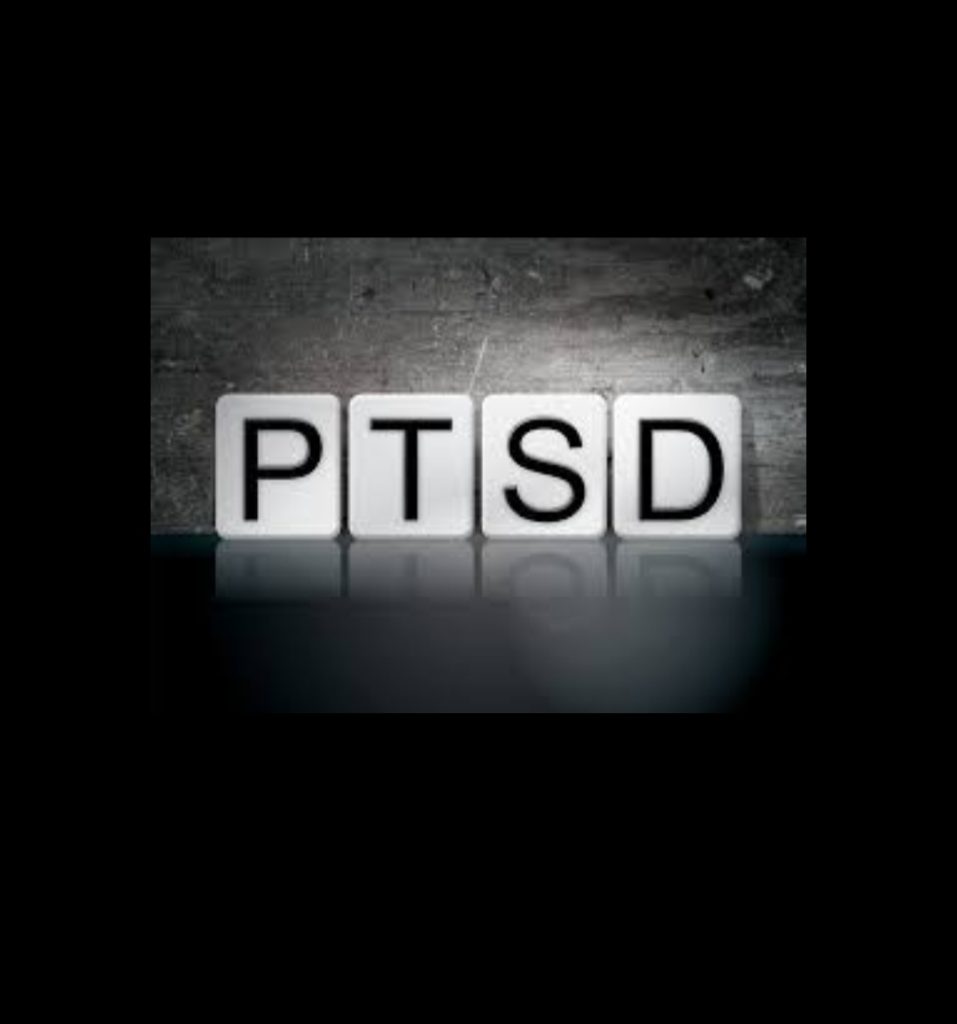 A black photo with the sign PTSD in the middle on Journeyofsmiley blog 