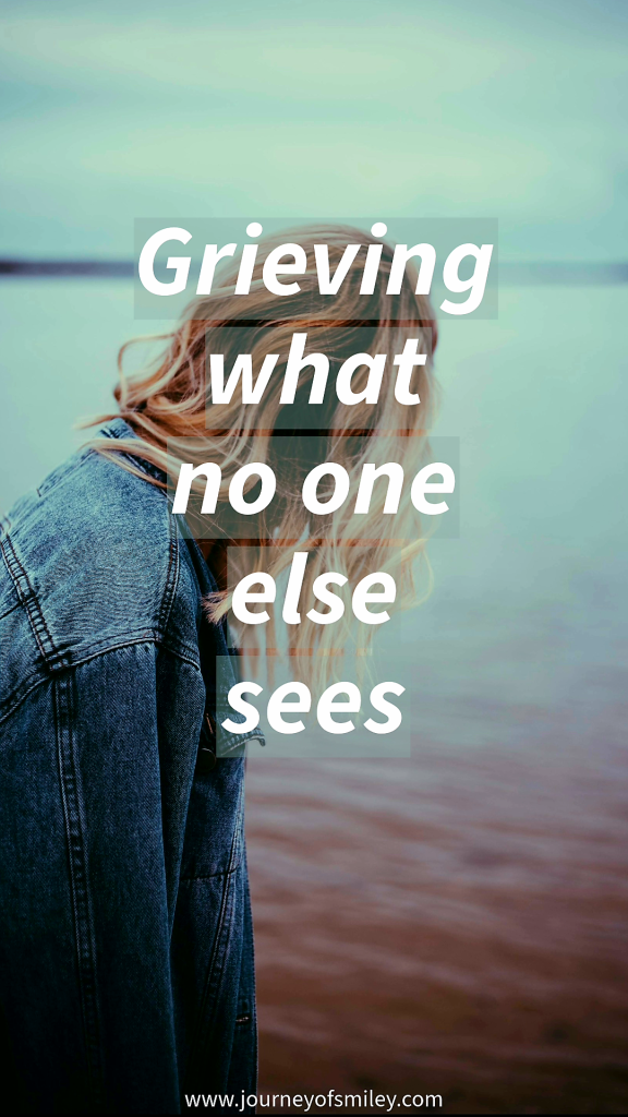 A woman looking into the sea, sea in background and the title in the middle is Grieving what no one else sees on Journeyofsmiley.com