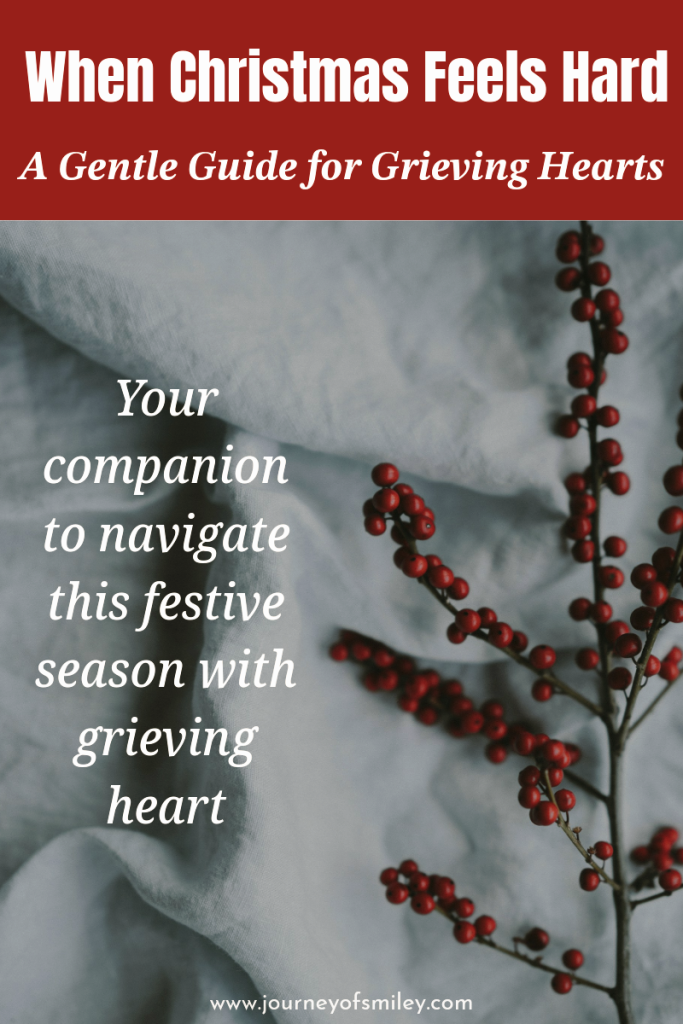 White snow background with red berries on the right side of the image and on the left side is the writing: Your companion to navigate this festive season with grieving heart and on the top is the title When Christmas Feels Hard, A Gentle Guide for Grieving Hearts on Journeyofsmiley.com 