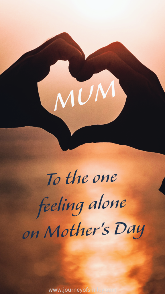 Two hands forming heart shape over sea and in the heart is written Mum, and below is To the one feeling alone on Mother's Day on Journeyofsmiely blog 