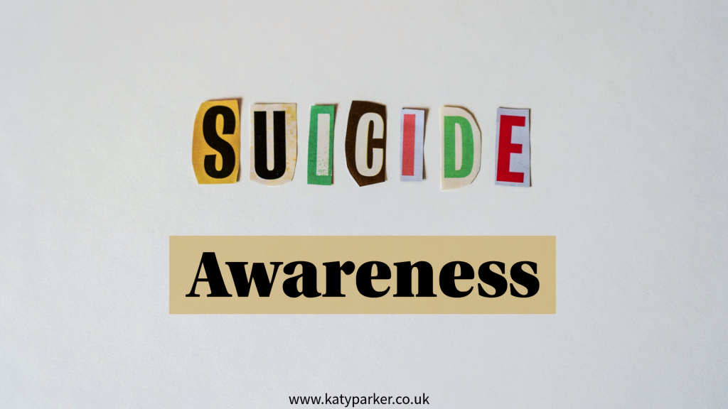 while background with colourful word Suicide and in black Awareness on katyparker.co.uk